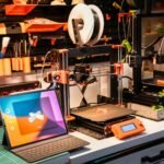 a laptop computer sitting on top of a table